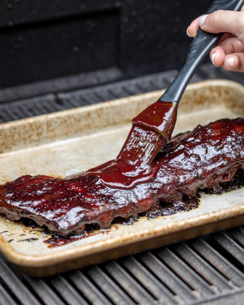 Spicy dark sweet cherry BQQ sauce ribs